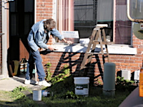 Man working on a building.