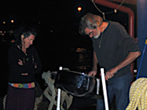 Woman and man with steel drum